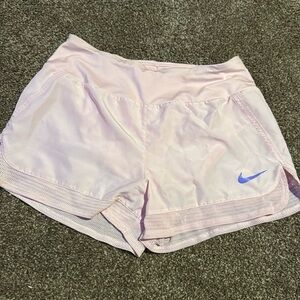 Pink Nike shorts for running